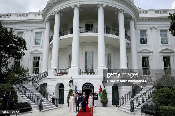 President Donald Trump and first lady Melania Trump welcome King Abdullah of Jordan and Queen Rania to the White House June 25, 2018 in Washington,...