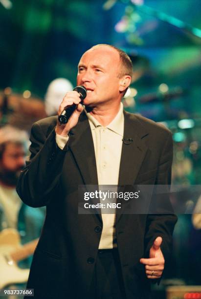 Episode 1627 -- Pictured: Musical guest Phil Collins performing on June 16, 1999 --