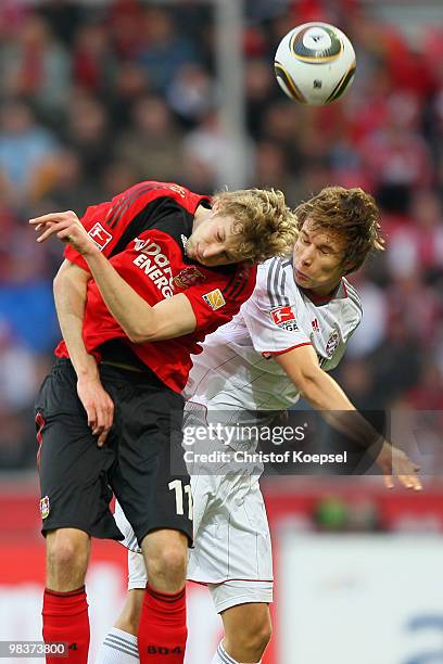Stefan Kiessling of Leverkusen and Holger Badstuber of Bayern go up for a header during the Bundesliga match between Bayer Leverkusen and FC Bayern...