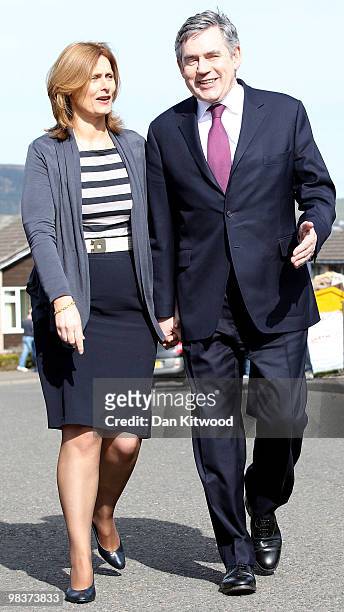 British Prime Minister Gordon Brown and wife Sarah Brown arrive to meet locals on a residential street in Lochgelly during the Labour Party's...