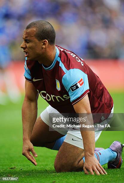 Gabriel Agbonlahor of Aston Villa kneels on the turf during the FA Cup sponsored by E.ON Semi Final match between Aston Villa and Chelsea at Wembley...
