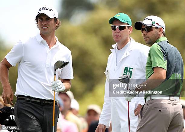 Adam Scott of Australia greets Sergio Garcia of Spain on the first tee during the third round of the 2010 Masters Tournament at Augusta National Golf...