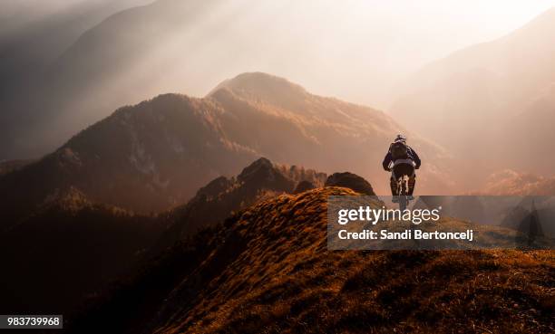 magic moments in the mountains - mountainbiking stock-fotos und bilder