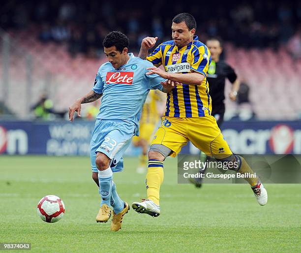 Ezequiel Lavezzi of Napoli and Valerj Bojinov of Parma in action during the Serie A match between SSC Napoli and Parma FC at Stadio San Paolo on...