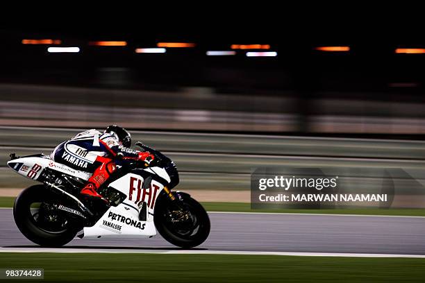 Spain's Jorge Lorenzo of Fiat Yamaha Team races during the 2010 MotoGP free practice at the Losail International Circuit in Doha on April 10, 2010....