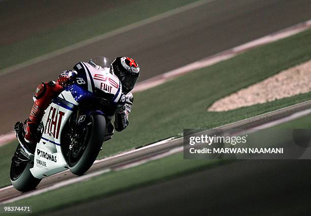 Spain's Jorge Lorenzo of Fiat Yamaha Team races during the 2010 MotoGP free practice at the Losail International Circuit in Doha on April 10, 2010....