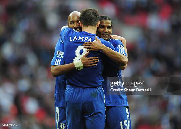 Frank Lampard of Chelsea celebrates scoring the third goal with teammates Nicolas Anelka and Florent Malouda during the FA Cup sponsored by E.ON Semi...