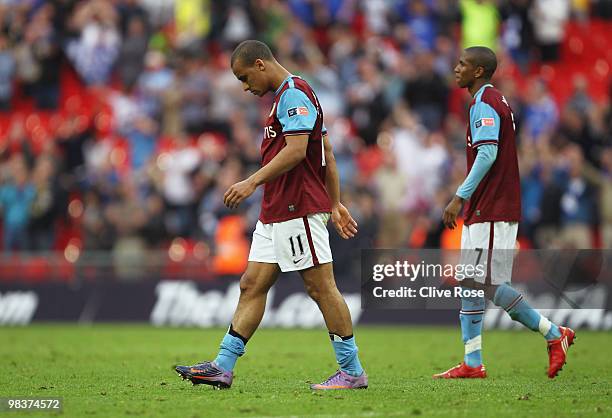 Gabriel Agbonlahor and Ashley Young of Aston Villa walk slowly off the pitch after defeat in the FA Cup sponsored by E.ON Semi Final match between...