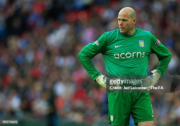 Brad Friedel of Aston Villa is dejected after conceding the third goal during the FA Cup sponsored by E.ON Semi Final match between Aston Villa and...