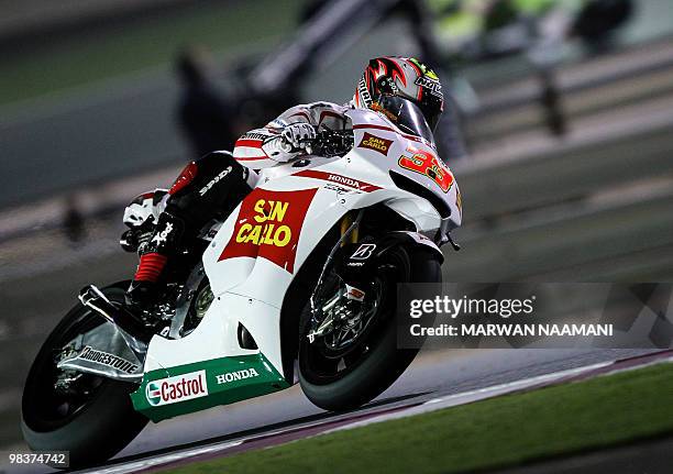 Italy's Marco Melandri of San Carlo Honda Gresini Team races during the 2010 MotoGP free practice at the Losail International Circuit in Doha on...