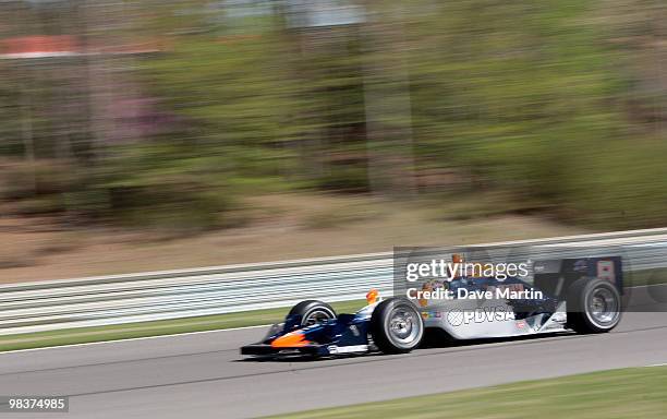 Viso of Venezuela, driver of the PDVSA Jet Aviation KVRT Dallara Honda races out of turn 11 during qualifying for the IRL IndyCar Series Grand Prix...