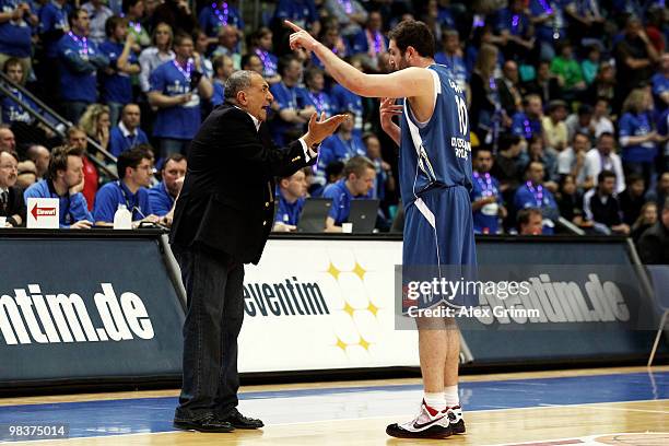 Head coach Murat Didin of Frankfurt discusses with Dragan Labovic during the semi final between Deutsche Bank Skyliners and Eisbaeren Bremerhaven at...