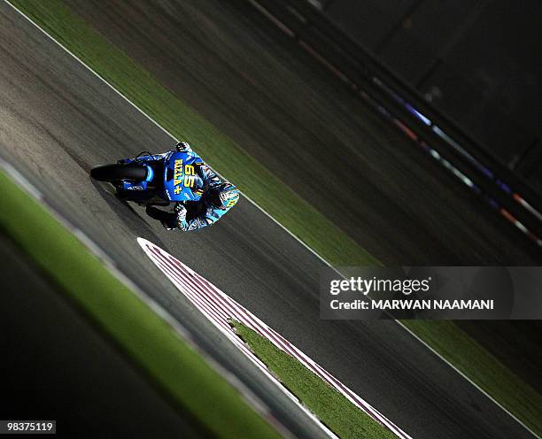 Italy's Loris Capirossi of Rizla Suzuki Team races during the 2010 MotoGP free practice at the Losail International Circuit in Doha on April 10,...