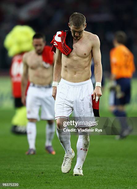 Bastian Schweinsteiger and Franck Ribery of Bayern look dejected after the final whistle of the Bundesliga match between Bayer Leverkusen and FC...