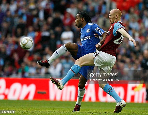 Chelsea's Ivory Coast striker Didier Drogba vies with Aston Villa's Welsh defender James Collins during the FA Cup semi-final football match at...