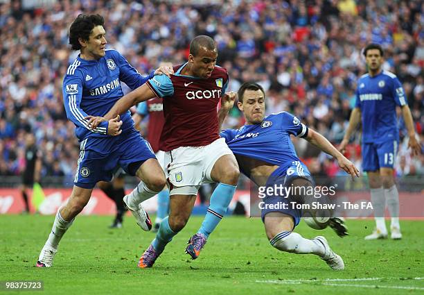 Gabriel Agbonlahor of Aston Villa is tackled by John Terry of Chelsea during the FA Cup sponsored by E.ON Semi Final match between Aston Villa and...