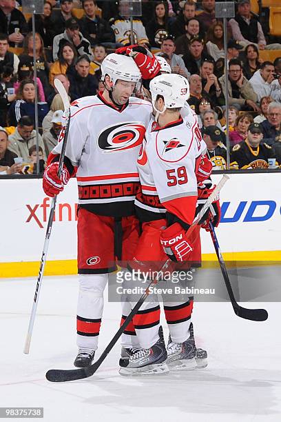 Chad LasRose of the Carolina Hurricanes celebrates with his teammate after a goal against the Boston Bruins at the TD Garden on April 10, 2010 in...