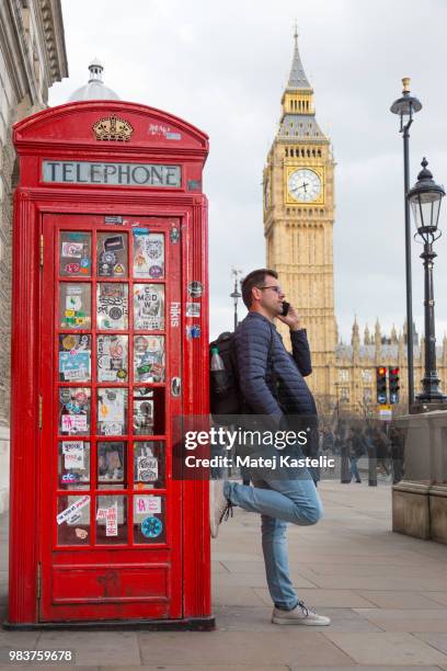 Man Using Red Telephone 165 Big Red Telephone Stock Photos, High-Res Pictures, and Images ...