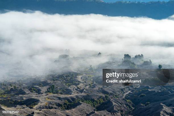 beautiful view landscape of active volcano crater at bromo tengger semeru national park, east java of indonesia. - shaifulzamri bildbanksfoton och bilder