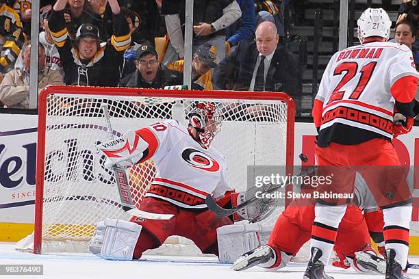 Cam Ward of the Boston Bruins makes a save during the game against the Boston Bruins at the TD Garden on April 10, 2010 in Boston, Massachusetts.