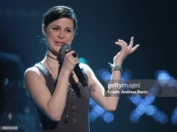 Singer Lena Meyer-Landrut performs during the 'Verstehen Sie Spass?' television show on April 10, 2010 in Halle, Germany.