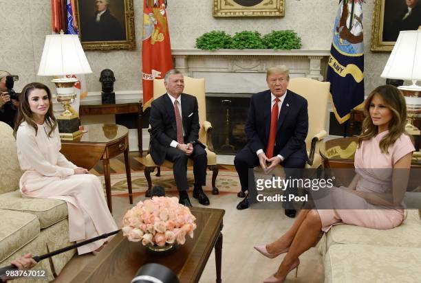 President Donald Trump and first lady Melania Trump meet with King Abdullah II and Queen Rania of Jordan in the Oval Office of the White House on...