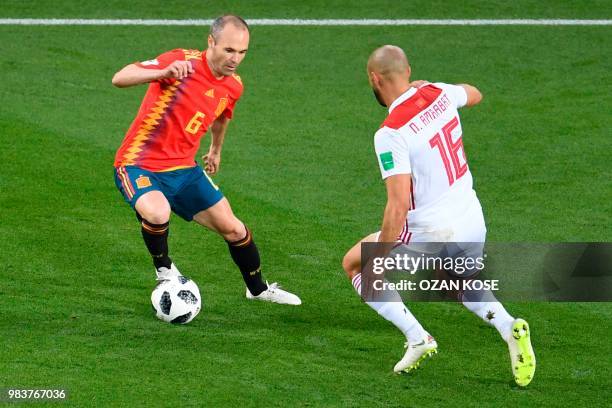 Spain's midfielder Andres Iniesta vies with Morocco's forward Noureddine Amrabat during the Russia 2018 World Cup Group B football match between...