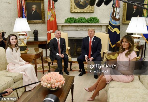 President Donald Trump and first lady Melania Trump meet with King Abdullah II and Queen Rania of Jordan in the Oval Office of the White House on...