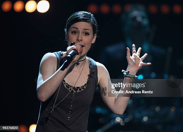 Singer Lena Meyer-Landrut performs during the 'Verstehen Sie Spass?' television show on April 10, 2010 in Halle, Germany.