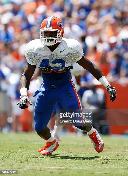 Linebacker Jelani Jenkins of the Florida Gators drops back into coverage during the Orange & Blue game at Ben Hill Griffin Stadium on April 10, 2010...