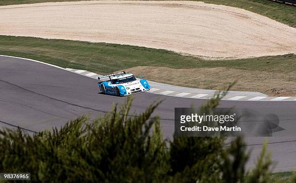 Memo Rojas, driver of the Chip Ganassi Racing BMW Riley races through turn two at the start of the Porsche 250 auto race at the Barber Motorsports...