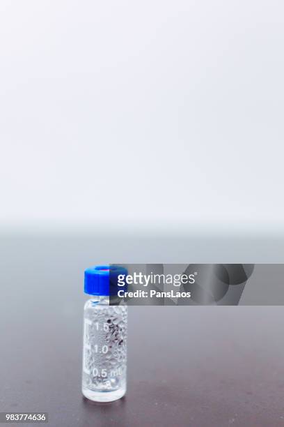 bottles with liquid for medical liquid test liquid - advance 2018 exam stock pictures, royalty-free photos & images