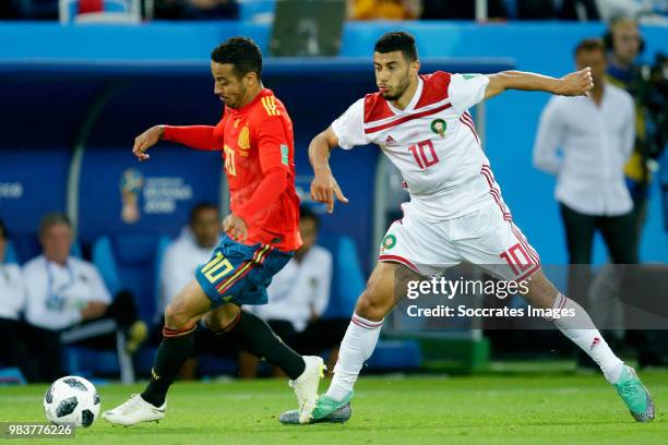 Thiago of Spain, Younes Belhanda of Morocco during the World Cup match between Spain v Morocco at the Kaliningrad Stadium on June 25, 2018 in...