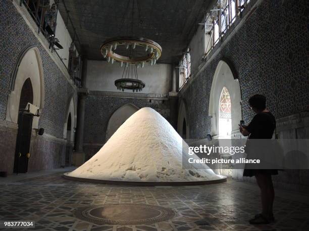 June 2018, Italy, Palermo: The art work of the Dutch artist Patricia Kaersenhout - a mountain of salt - at the Palazzo Forcella De Seta in Palermo....