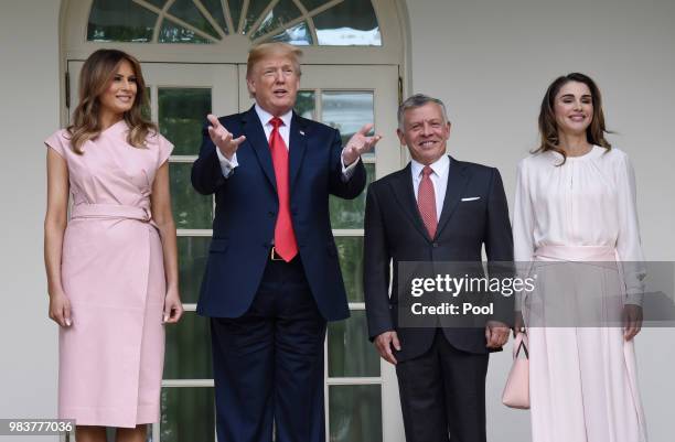 President Donald Trump and first lady Melania Trump greet King Abdullah II and Queen Rania of Jordan on their arrival at the South Portico of the...