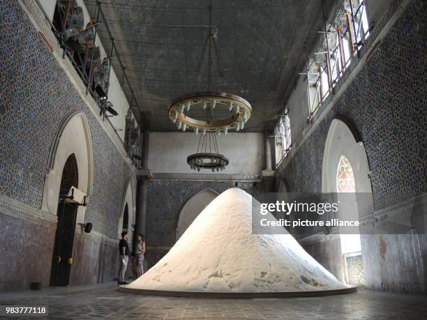 June 2018, Italy, Palermo: The art work of the Dutch artist Patricia Kaersenhout - a mountain of salt - at the Palazzo Forcella De Seta in Palermo....