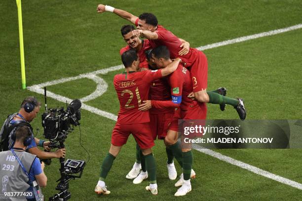 Portugal's forward Ricardo Quaresma celebrates scoring the opening goal with his teammates during the Russia 2018 World Cup Group B football match...