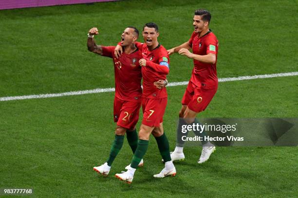 Ricardo Quaresma of Portugal celebrates with teammates Cristiano Ronaldo and Andre Silva after scoring his team's first goal during the 2018 FIFA...
