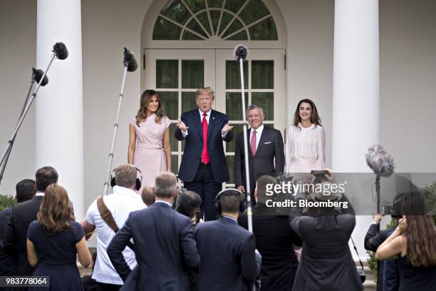Rania Al-Abdullah, Queen of Jordan, from right, King Abdullah II of Jordan, U.S. President Donald Trump and First Lady Melania Trump stand for...