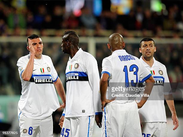 Lucio, Mario Balotelli, Maicon and Walter Samuel of FC Internazionale Milano look dejected during the Serie A match between ACF Fiorentina and FC...
