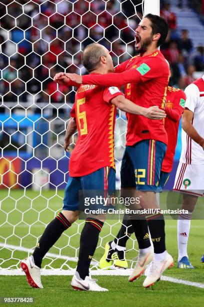 Isco of Spain celebrates with teammate Andres Iniesta after scoring his sides first goal during the 2018 FIFA World Cup Russia group B match between...