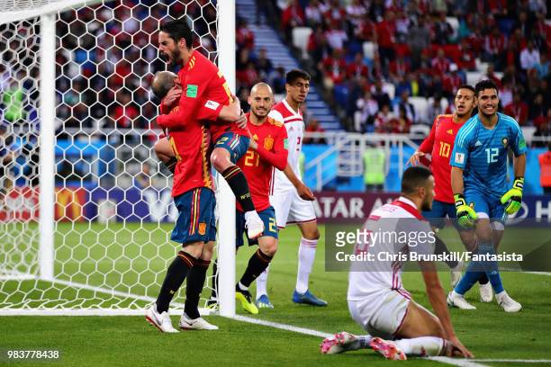 Isco of Spain celebrates with teammate Andres Iniesta after scoring his sides first goal during the 2018 FIFA World Cup Russia group B match between...