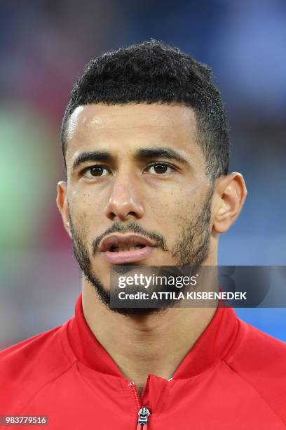 Morocco's midfielder Younes Belhanda listens to the national anthem before the Russia 2018 World Cup Group B football match between Spain and Morocco...