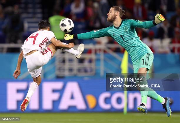 Mbark Boussoufa of Morocco collides with David De Gea of Spain during the 2018 FIFA World Cup Russia group B match between Spain and Morocco at...