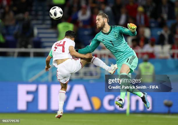 Mbark Boussoufa of Morocco collides with David De Gea of Spain during the 2018 FIFA World Cup Russia group B match between Spain and Morocco at...