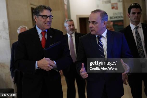 Secretary of Energy Rick Perry talks to Israeli Minister of National Infrastructure, Energy and Water Resources Yuval Steinitz piror to a lunch event...