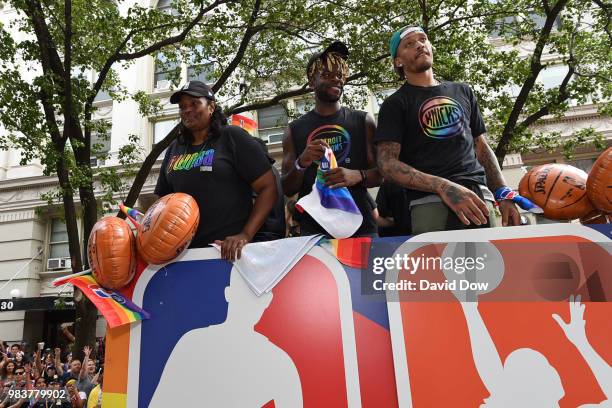 Kym Hampton, Reggie Bullock, and Michael Beasley during the NYC Pride Parade on June 24, 2018 in New York City, New York. NOTE TO USER: User...