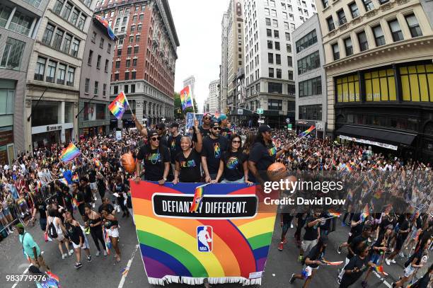 Teresa Weatherspoon, Lisa Borders, David Fizdale and Kym Hampton wave to the crowds during the NYC Pride Parade on June 24, 2018 in New York City,...