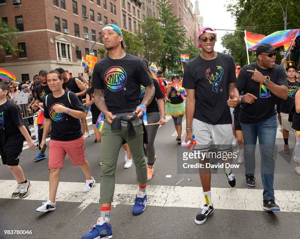 Michael Beasley of the New York Knicks and John Henson of the Milwaukee Bucks during the NYC Pride Parade on June 24, 2018 in New York City, New...