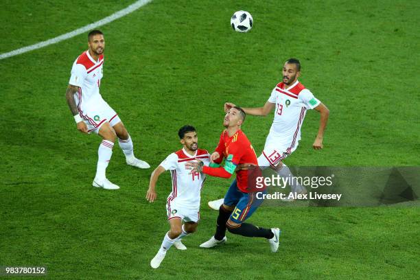 Mbark Boussoufa of Morocco battles for possession with Sergio Ramos of Spain during the 2018 FIFA World Cup Russia group B match between Spain and...